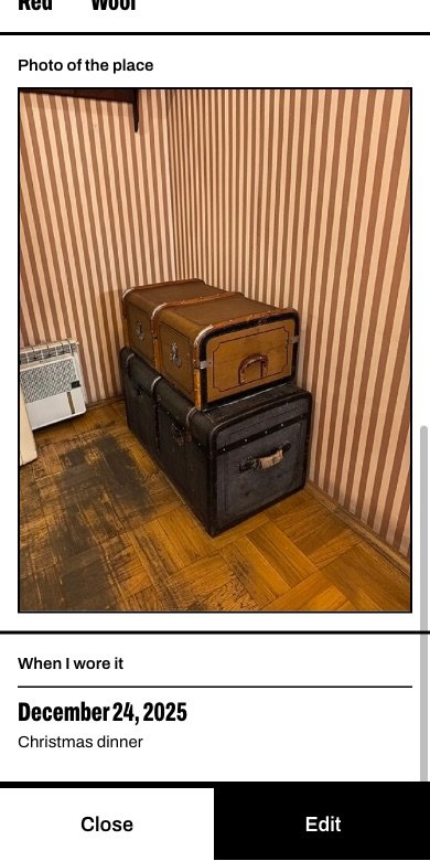 A photo of two trunks in a corner, and below it the date the sweater was last worn.
